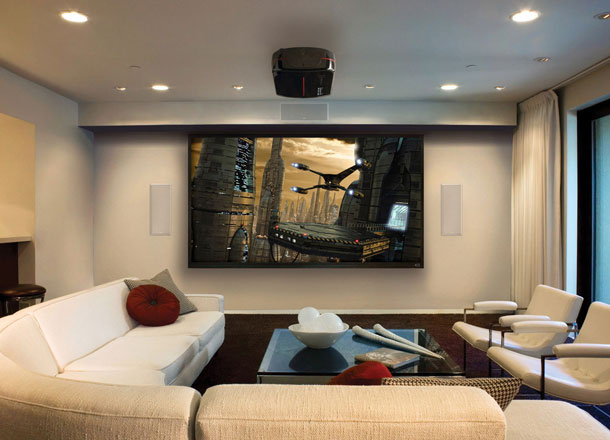 Breathtaking-White-Living-Room-Theaters-Interior-with-Sectional-Sofa-and-Chairs-Furnished-with-Glass-Table-plus-Completed-with-Ceiling-Lightings-and-Projector