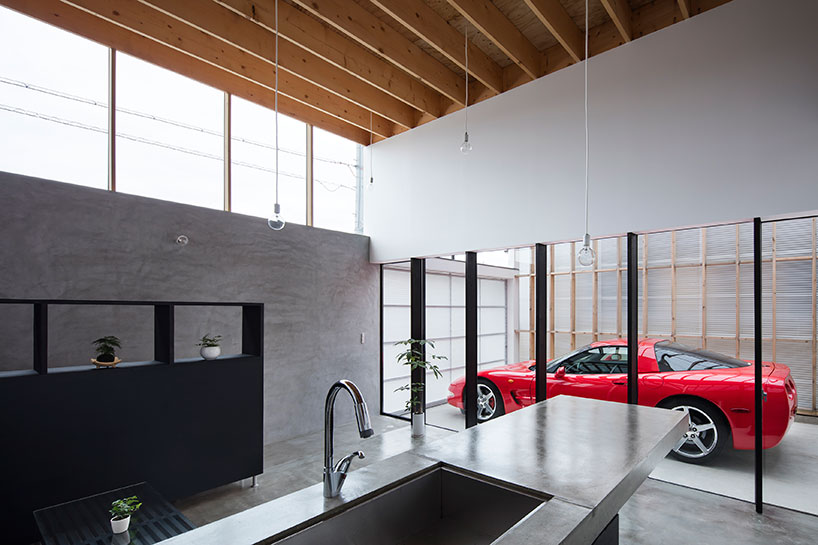 The Ultimate Petrolhead's Home Has A Transparent Garage