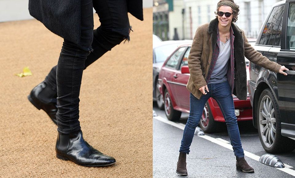 Harry Styles wearing leather and suede boots.