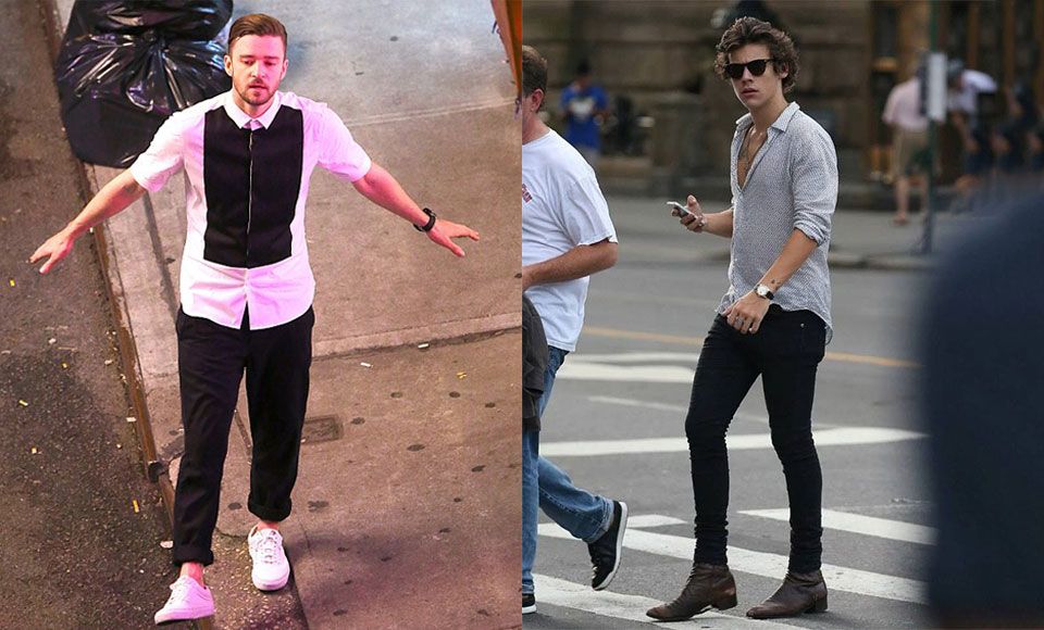 Justin Timberlake and Harry Styles wearing monochromatic black and white outfits. 
