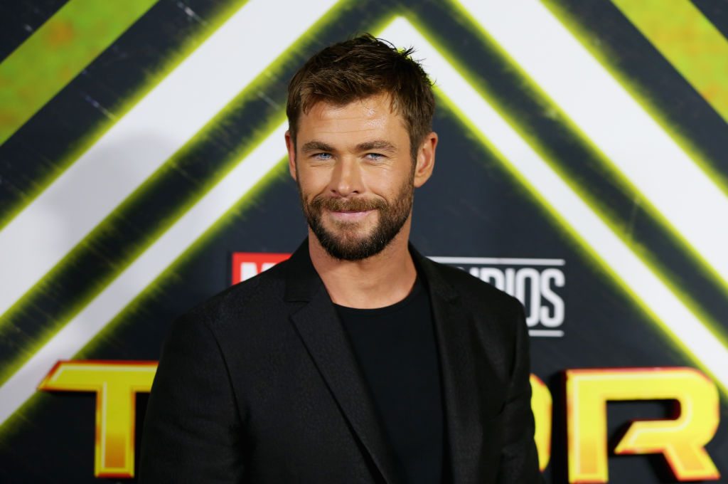 Chris Hemsworth Is Showing Men The Proper Way To Dress Down A Black Suit