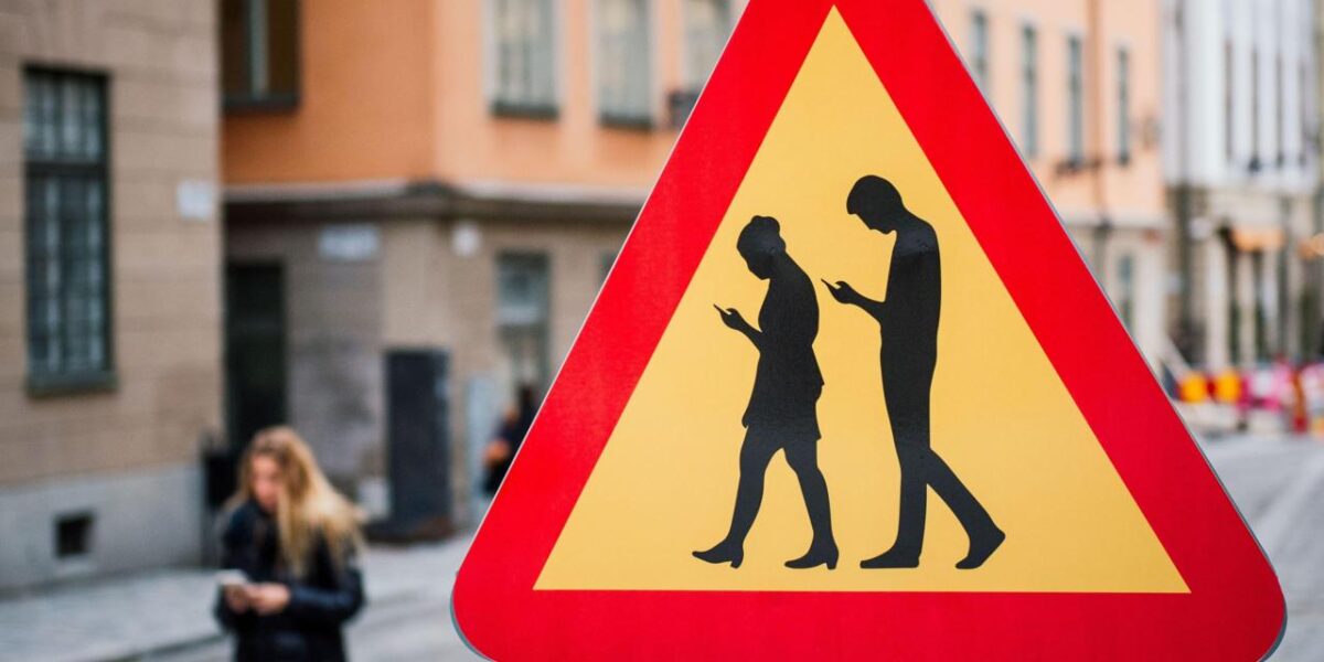 Pedestrian Lanes Reserved For 'Smartphone Zombies' Are Now A Reality