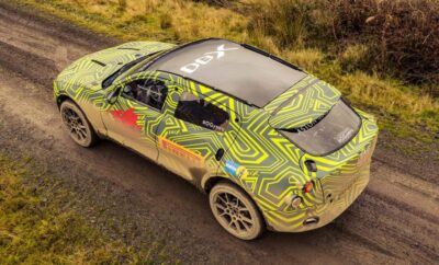 Aston Martin Unveils Its First Ever SUV On A Dirty Rally Stage