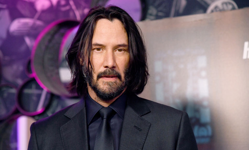 Keanu Reeves Rocked 'Tactical' Footwear With A Suit To The John Wick 3 Premiere