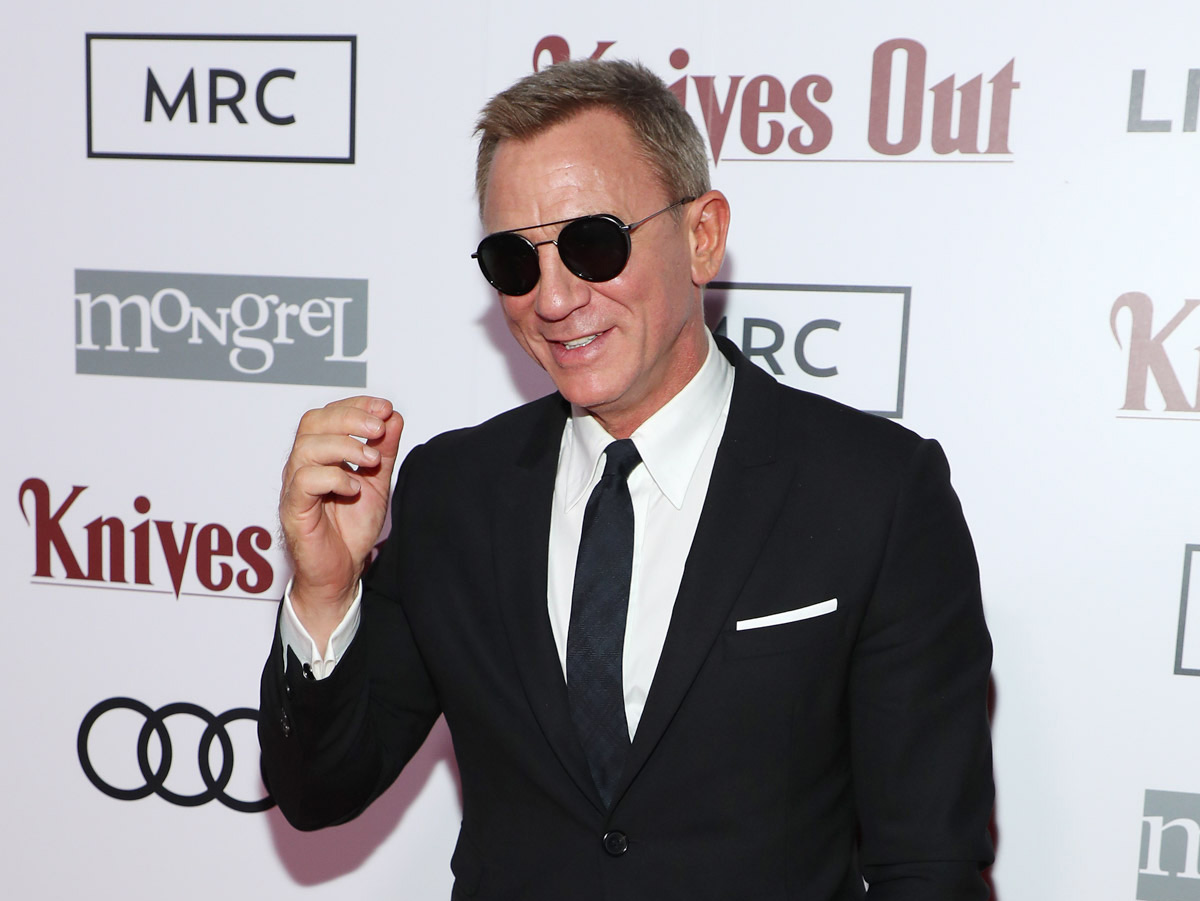 Daniel Craig Wears The Most 'Unique' Sneakers Ever With A Suit In Toronto