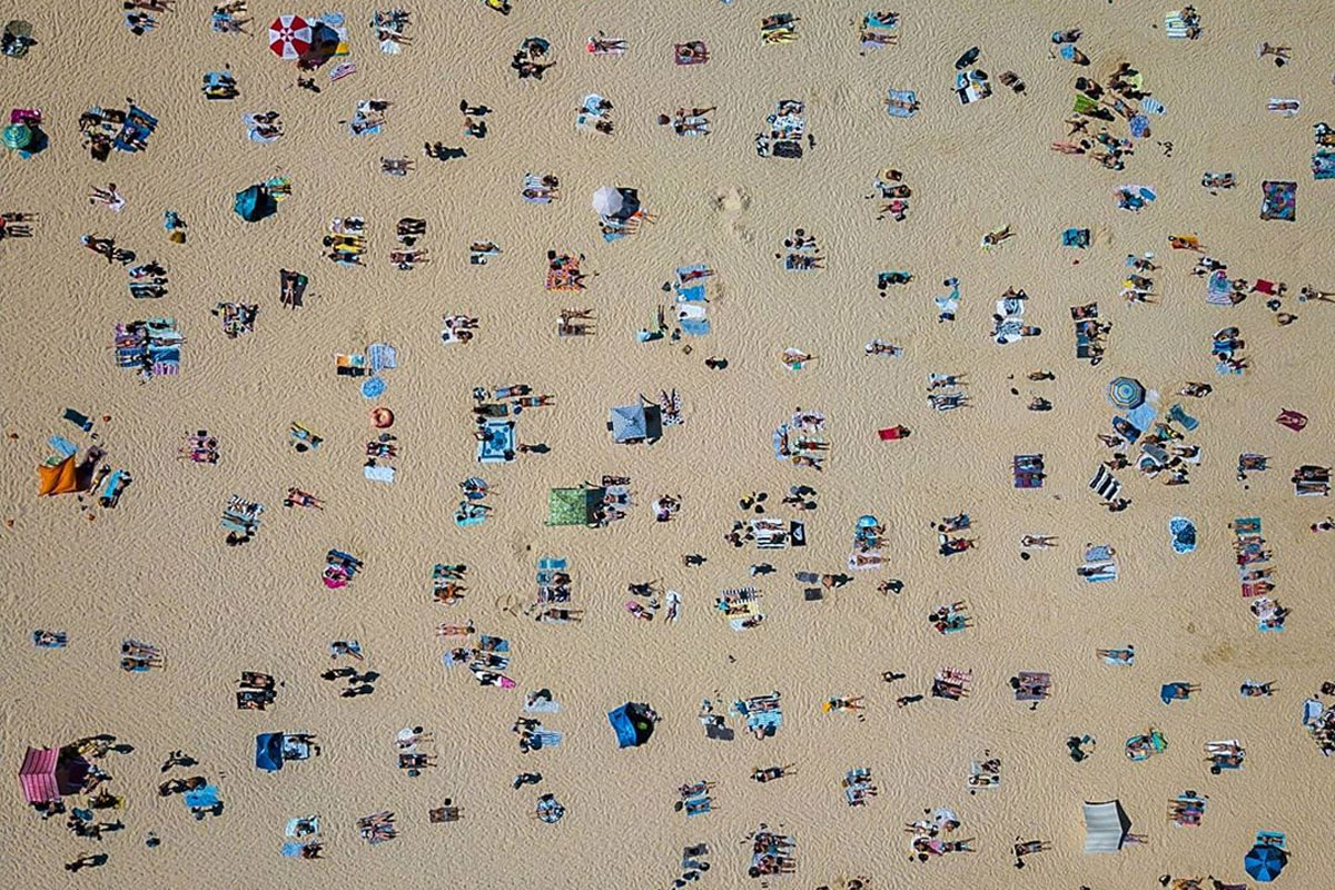 'Perfect' Bondi Beach Photo Shows Fine Art Of Social Distancing In Australia