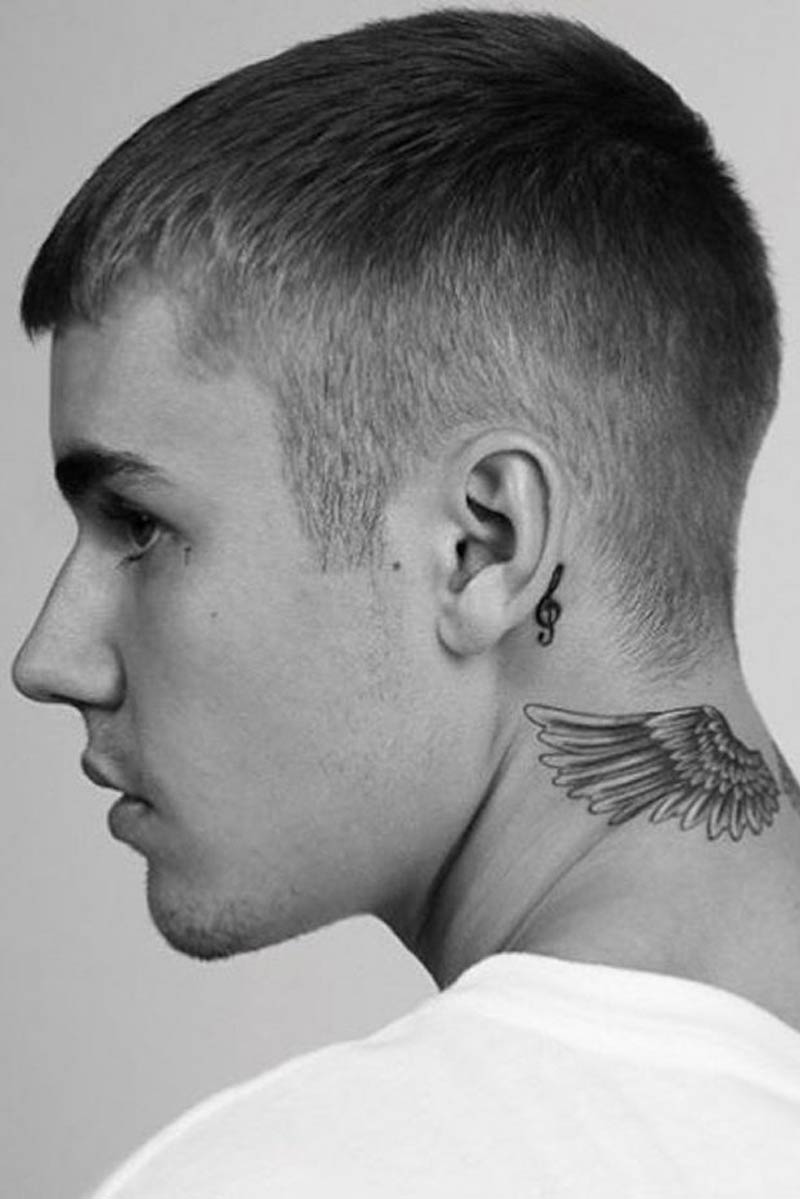 Justin Bieber with buzz cut hair cut, black and white