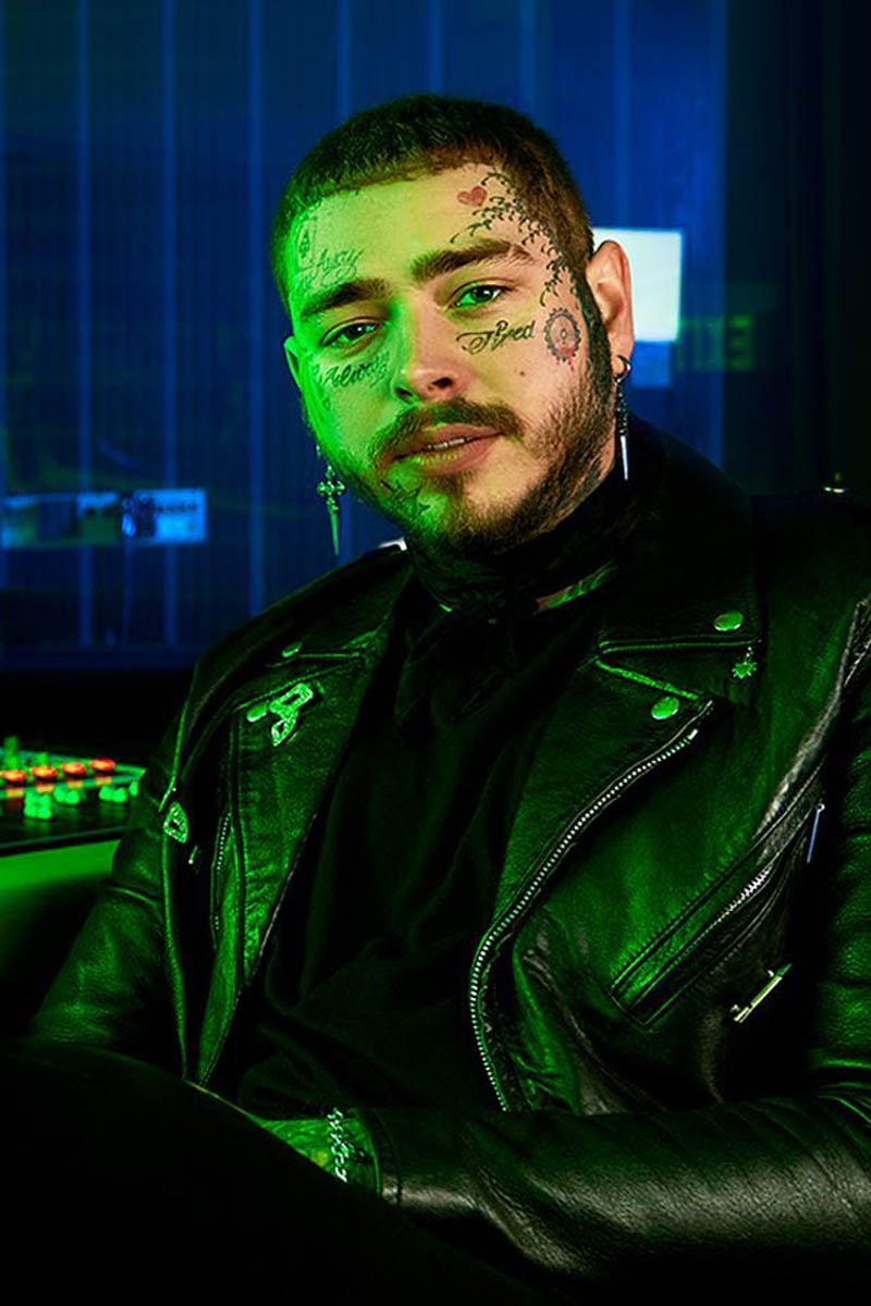 Post Malone wearing leather biker jacket and with Caesar haircut.
