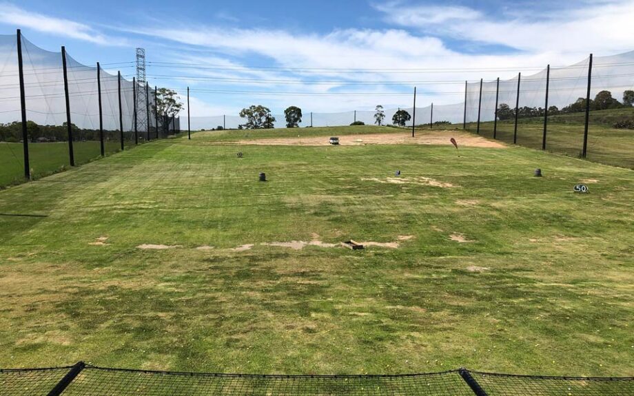 Sharks Golf driving range with placement markers.