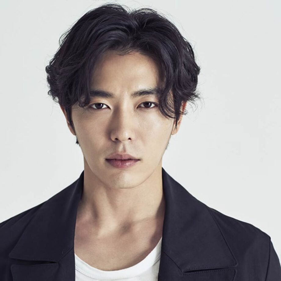 Kim-Jae Wook with curtains hairstyle.