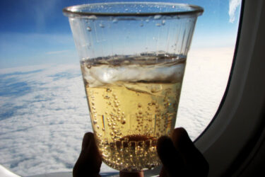 The One Drink You Should Always Order On A Flight