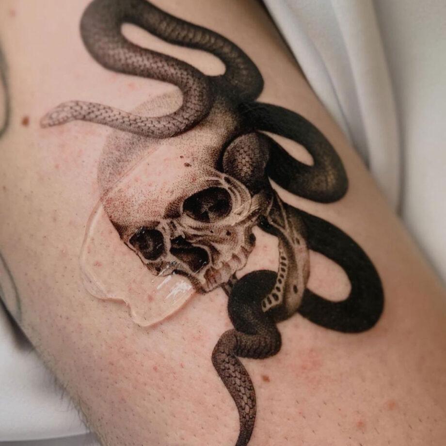 snake wrapped around full arm tattooTikTok Search