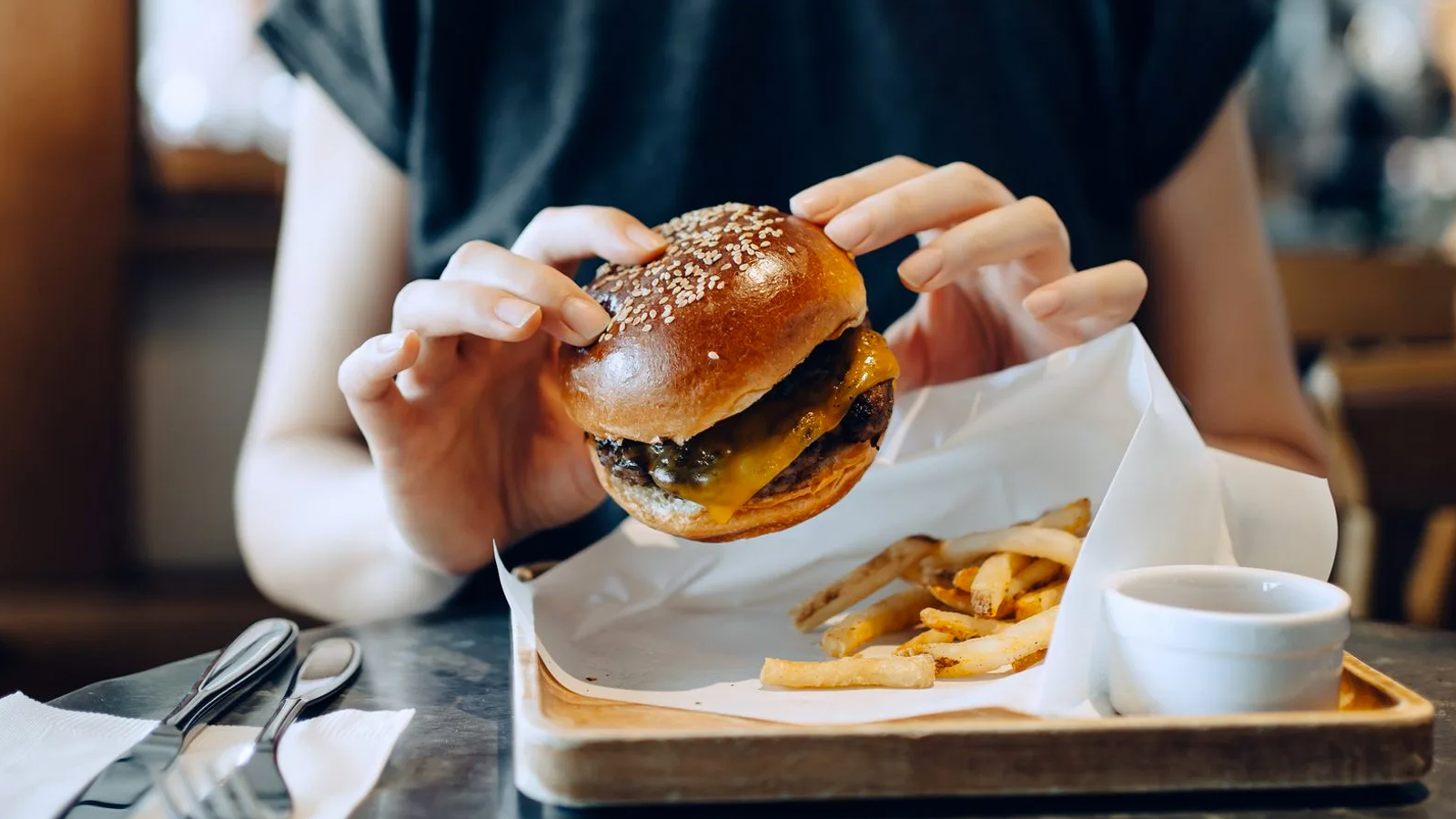 Age-Old Debate Settled: This Is The Correct Way To Eat A Burger
