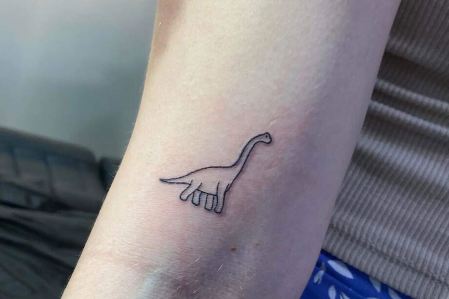 Small dinosaur tattoo