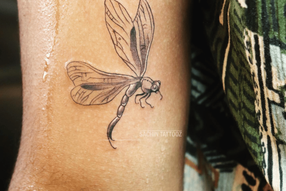 Dragonfly Small Tattoo Source @sachintattooist via Instagram