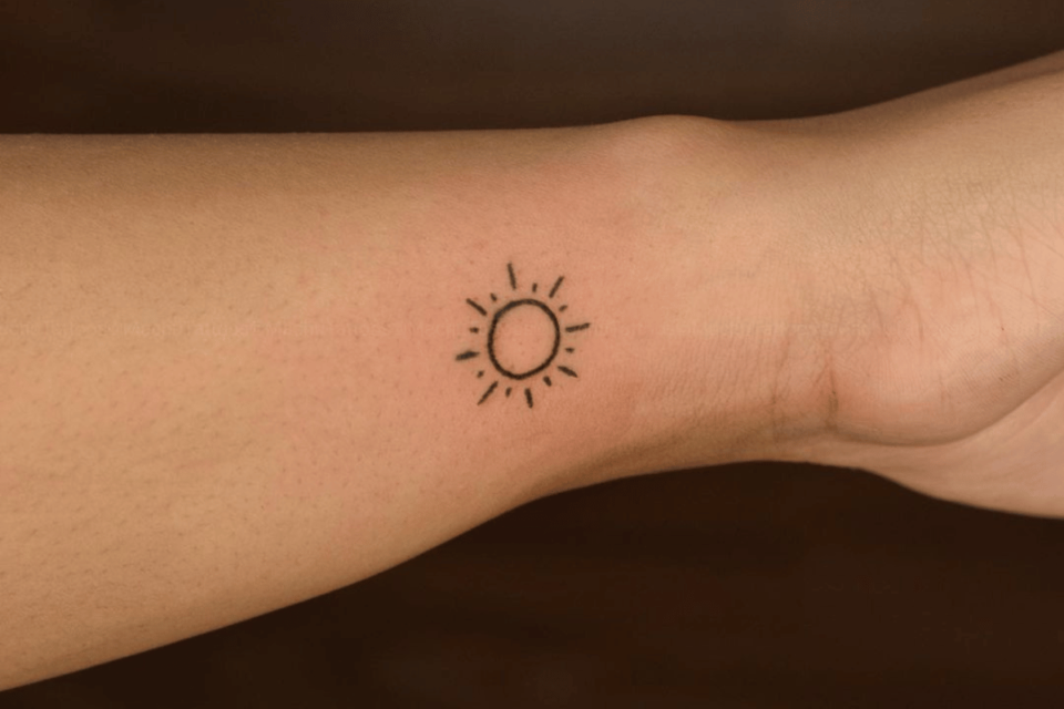 Sun Small Tattoo Source @machutattoos via Instagram