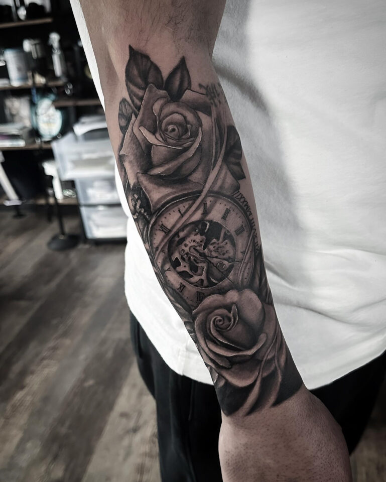 Forearm rose tattoo