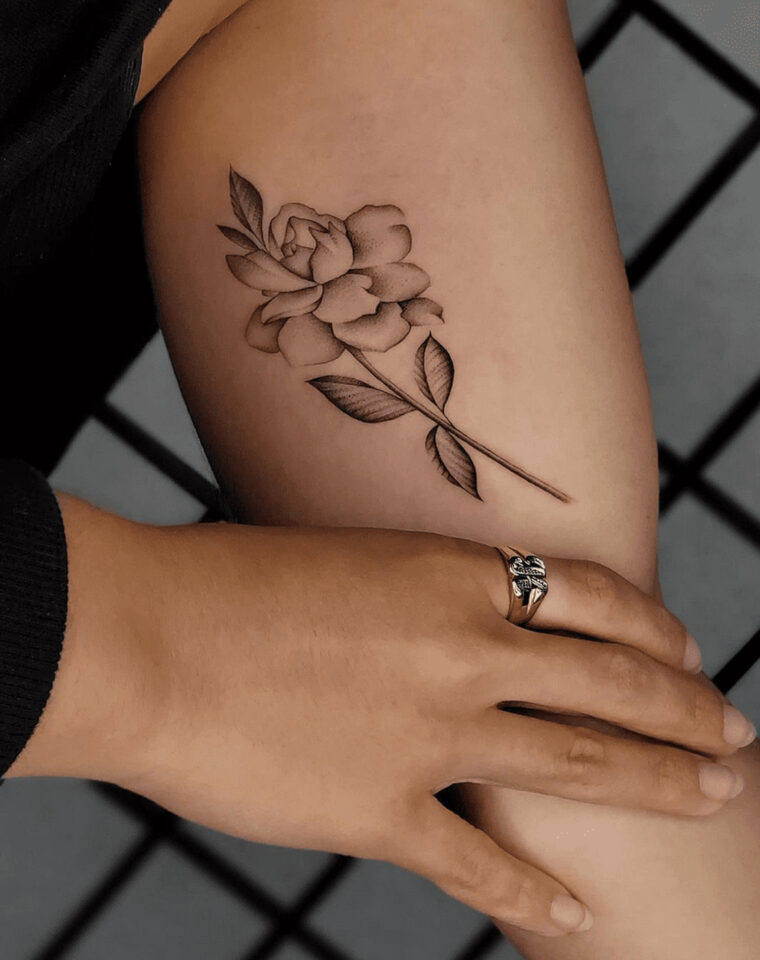 Bicep rose tattoo