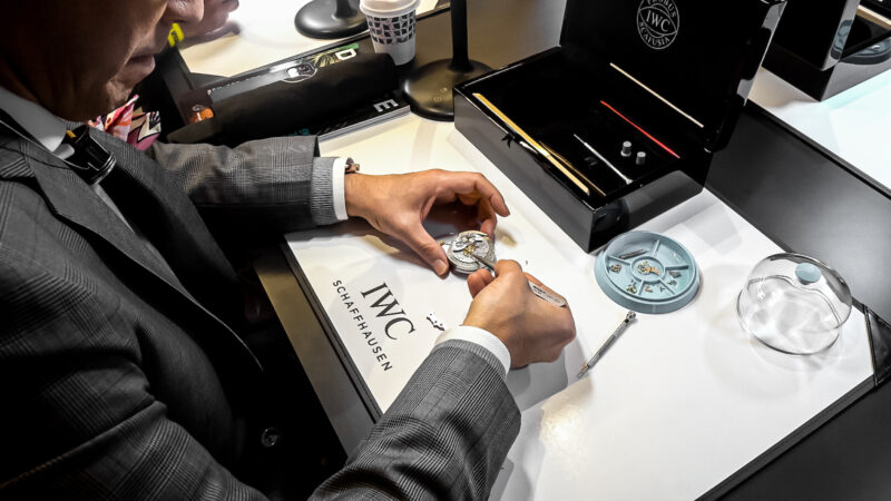 A guest takes part in one of IWC's watchmaking classes at DMARGE House 2022.