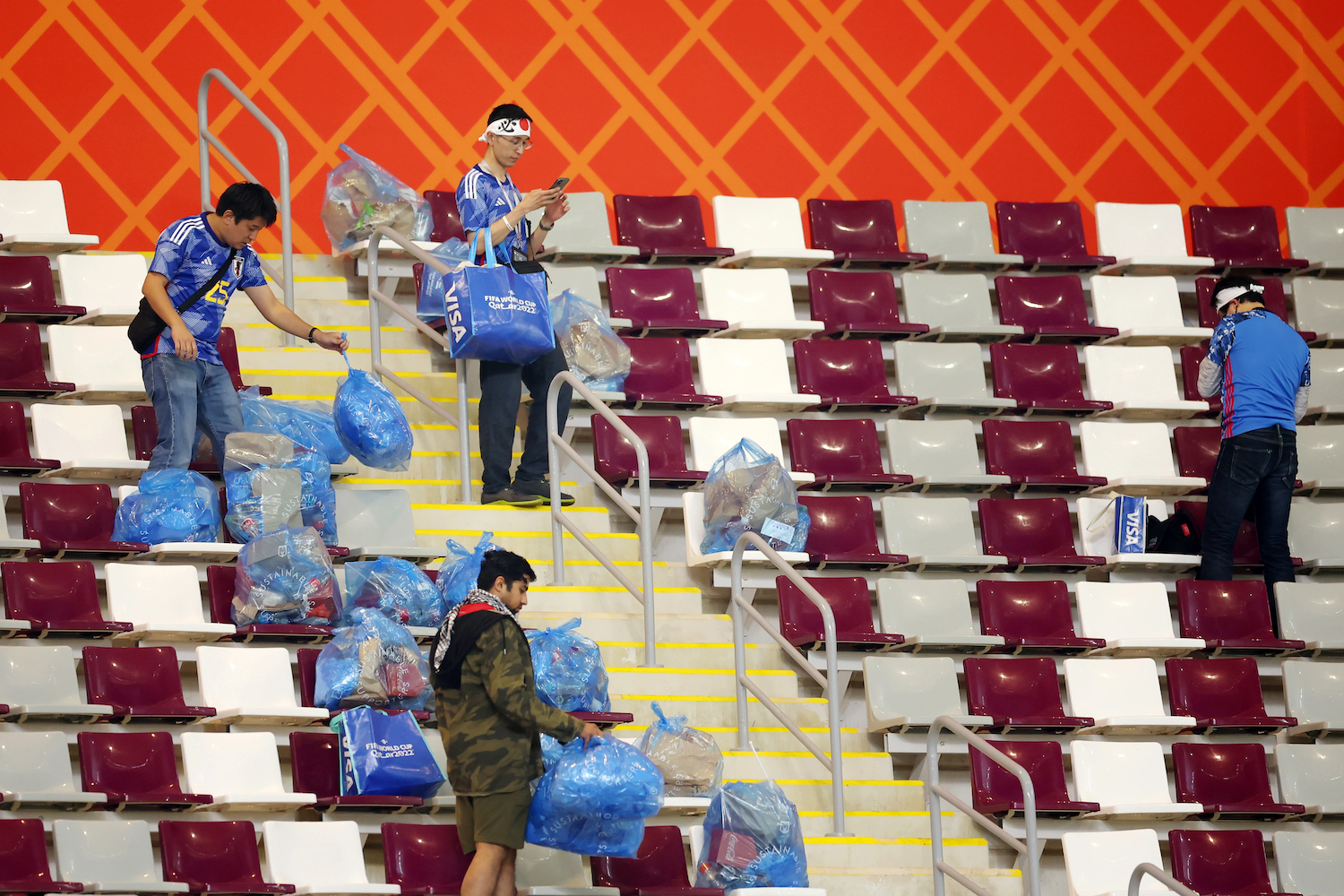 Japan World Cup Fans Stay Behind To Clean Up ‘Grubby’ German Fans’ Mess