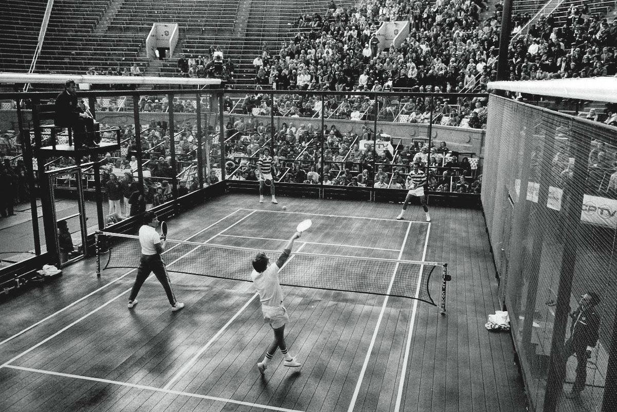 A black and white image of padel being played in the 1970s.