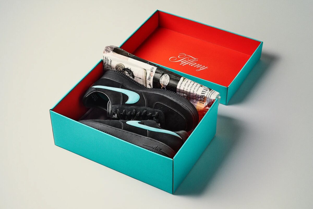 A pair of Tiffany & Co. x Nike Air Force 1 Low 1837 sneakers in their box.
