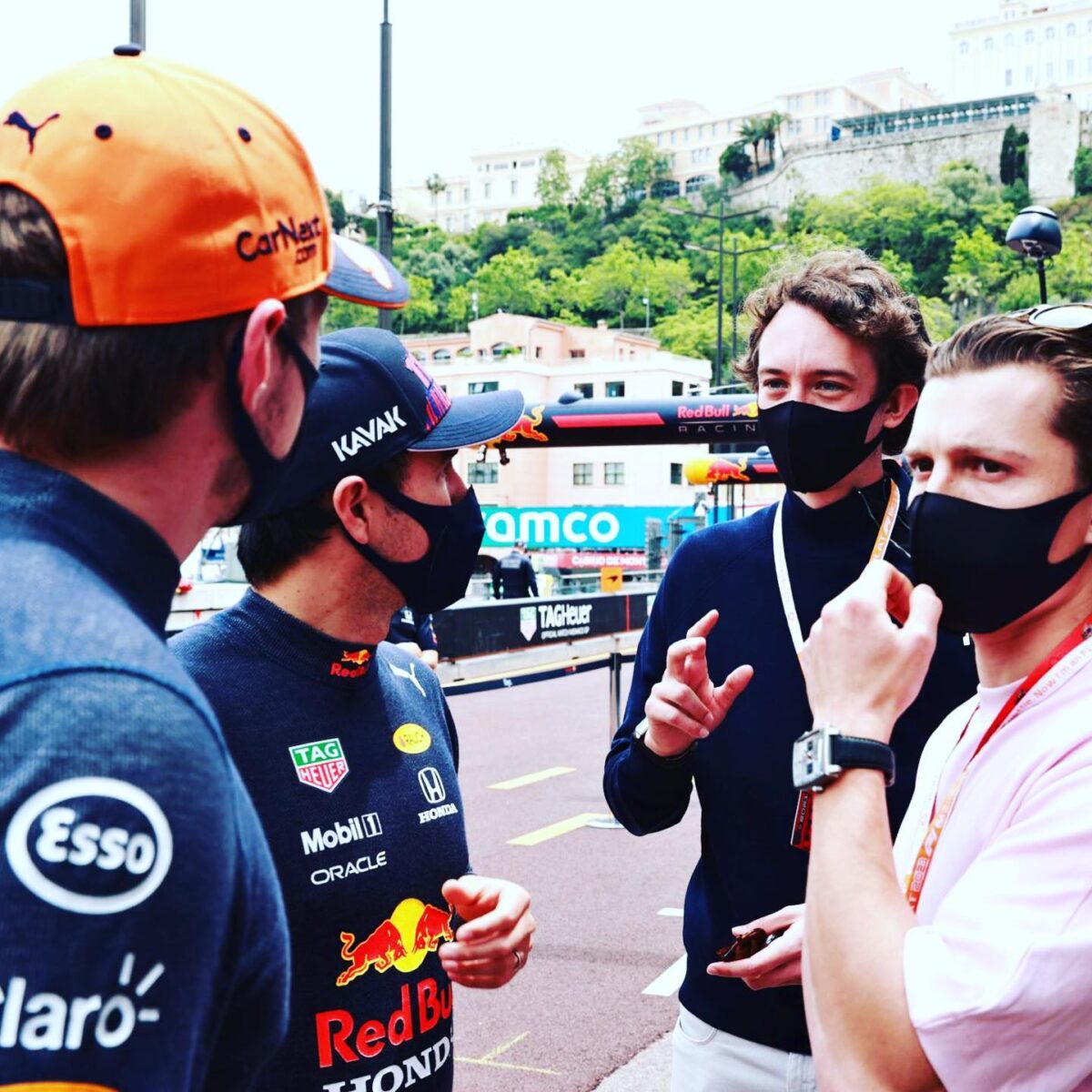 Arnault and Spider-Man actor Tom Holland chat with Red Bull's Max Verstappen and Sergio Pérez at the 2021 Monaco Grand Prix.