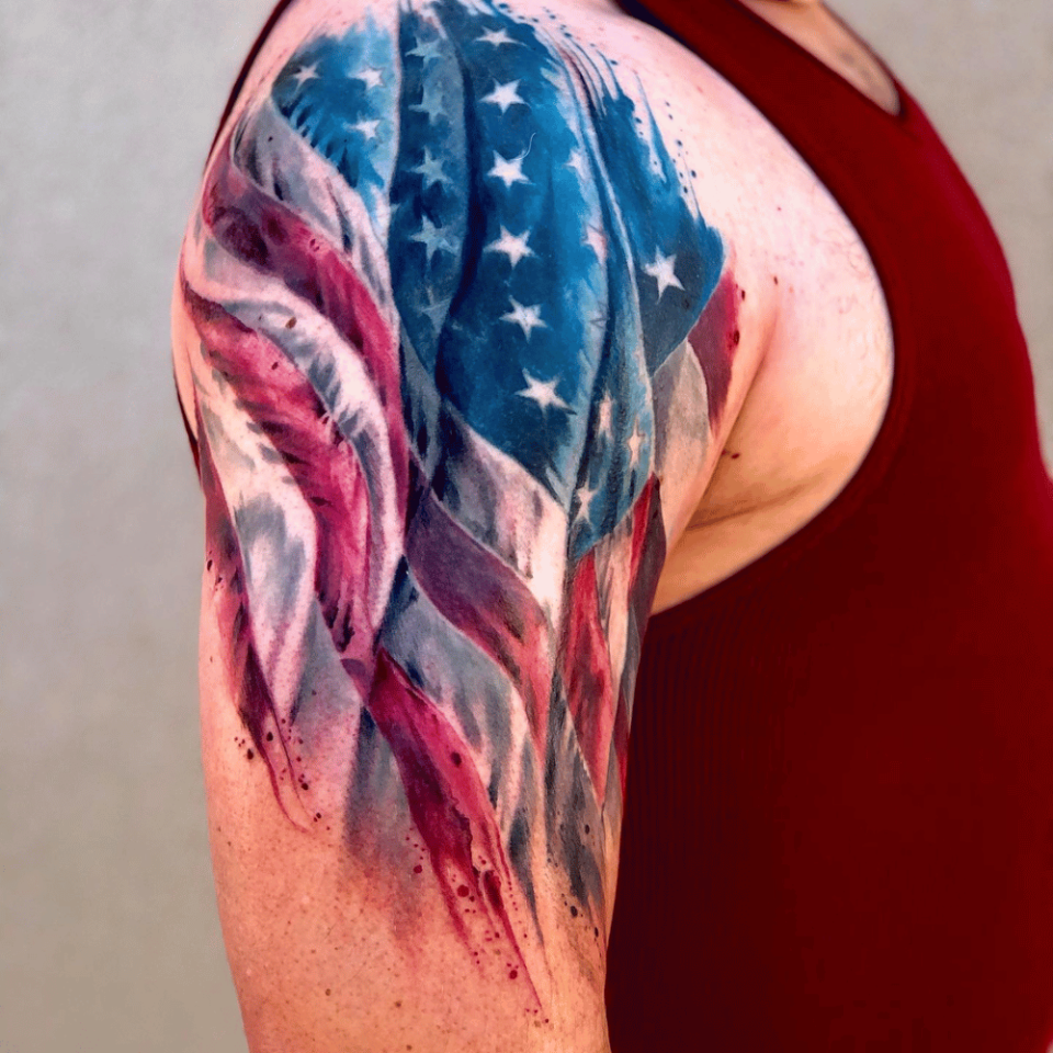 American Flag Shoulder Tattoo Source @truegrittattoo via Instagram