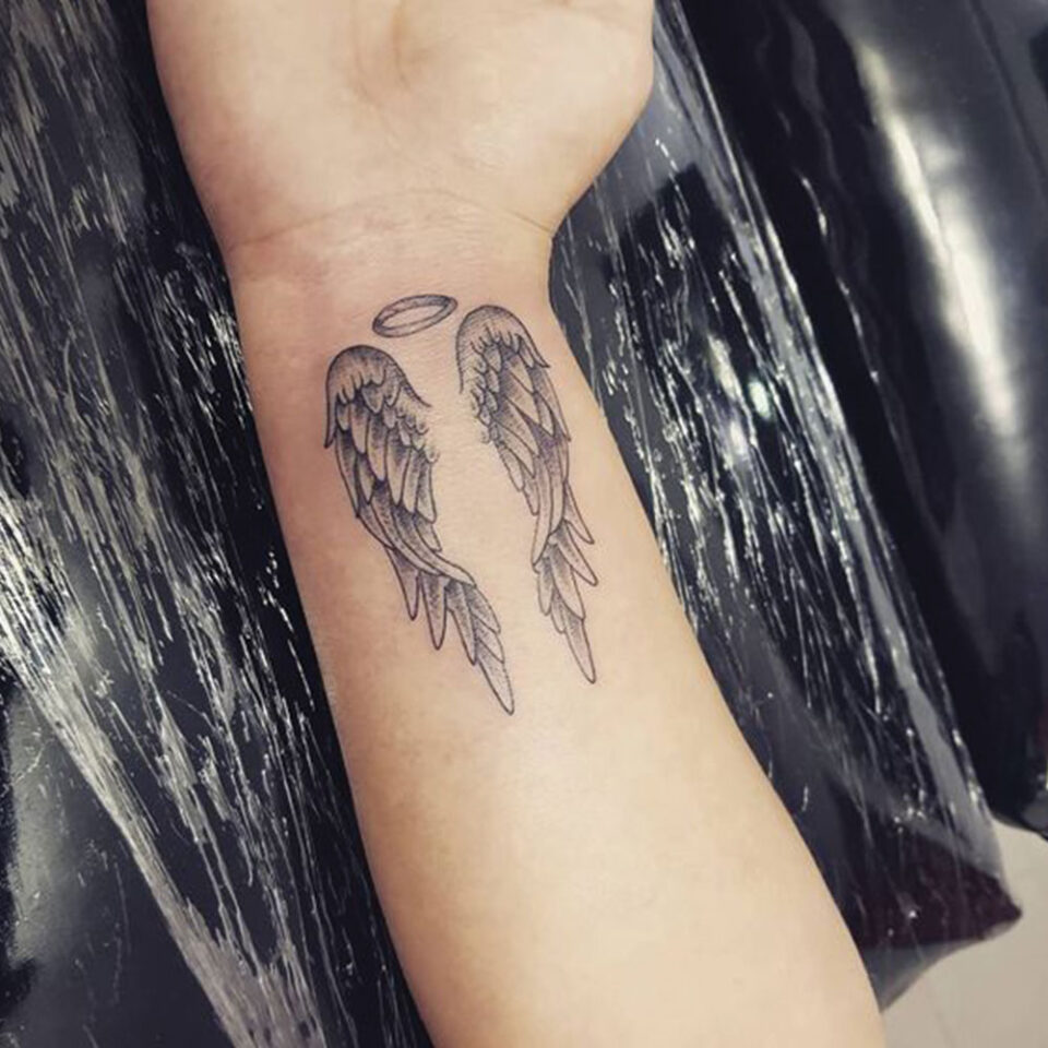 Angel Wing Wrist Tattoo