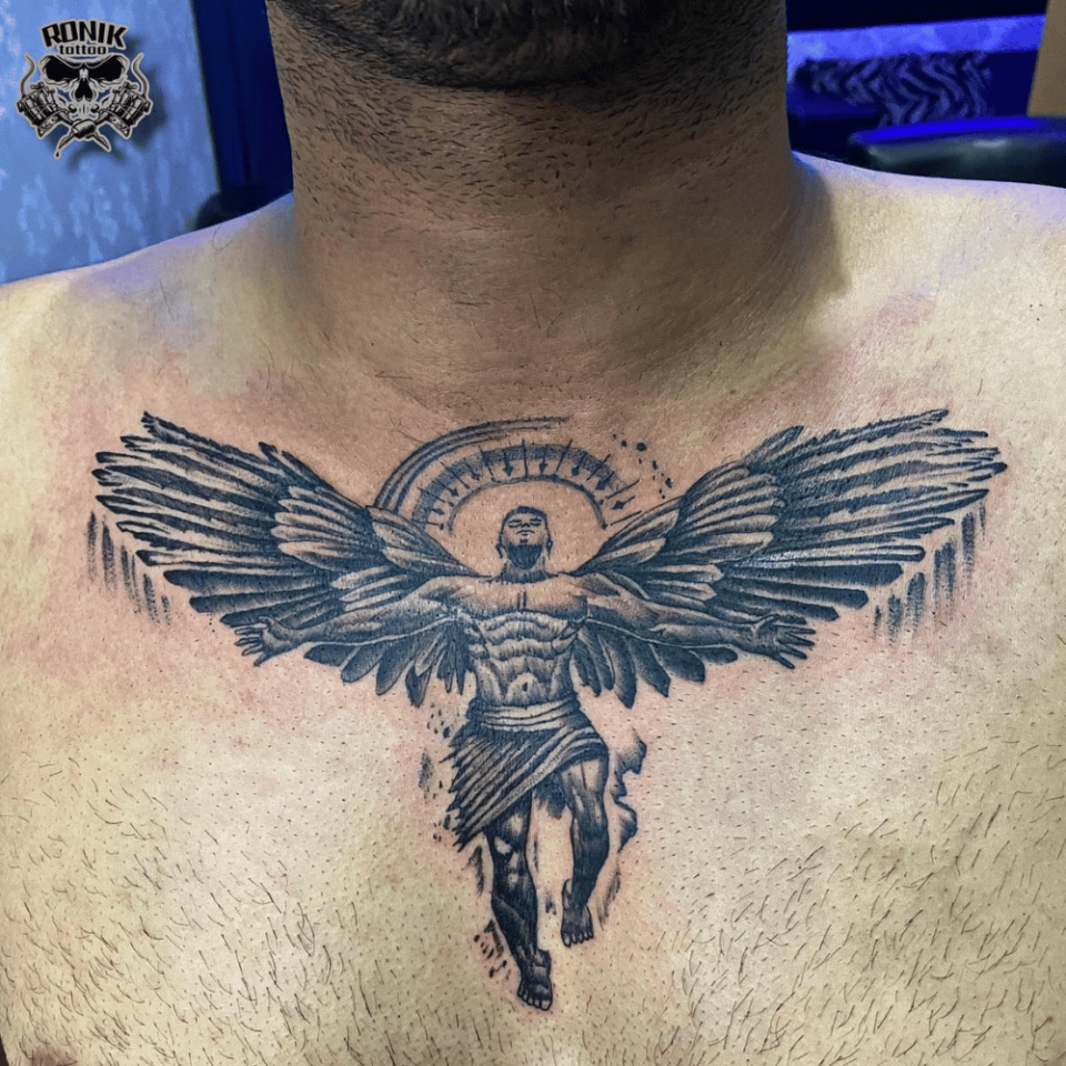 Angel Wings Chest Tattoo Source @ronik_tattoo_studio via Instagram