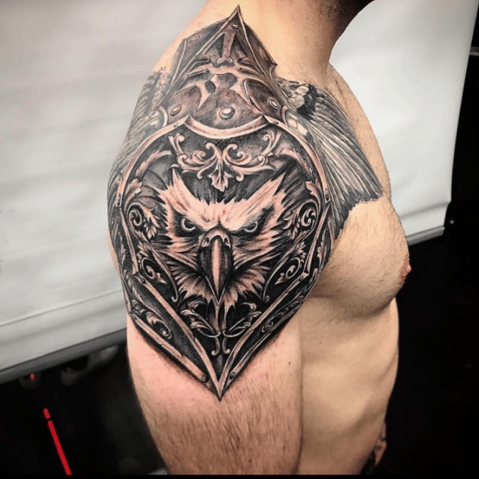 Armour Shoulder Tattoo Source @angerinktattoo via Instagram
