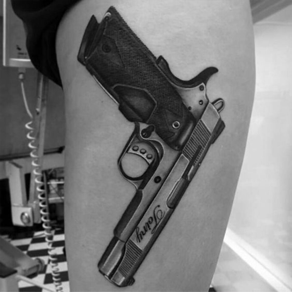 Gun Thigh Tattoo