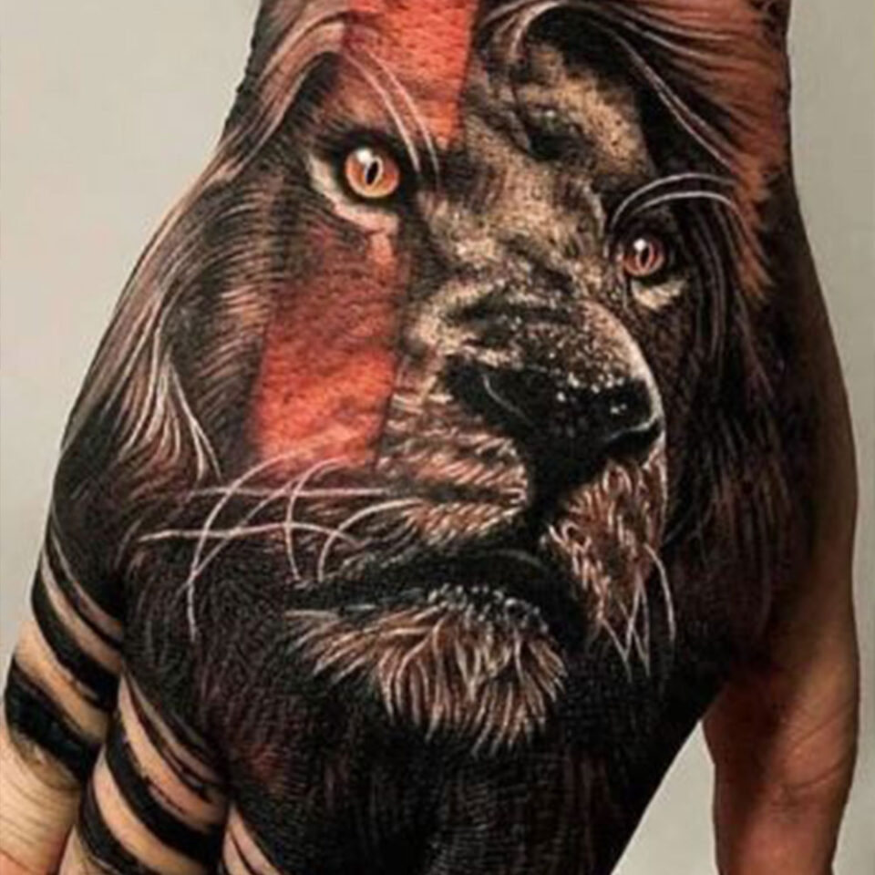 lion hand tattoo