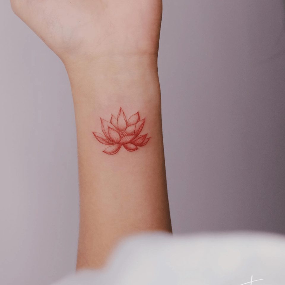 Lotus Wrist Tattoo Source @kata.tattoo via Instagram