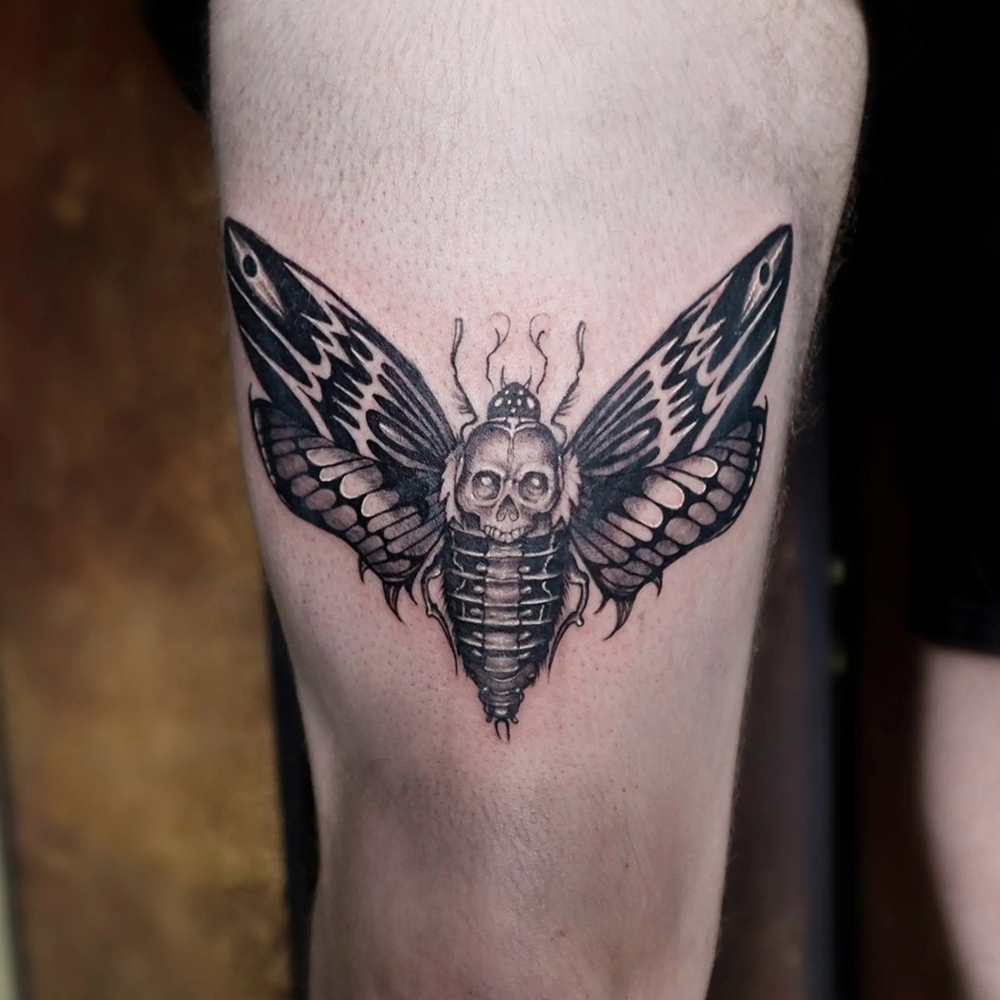 Moth Thigh Tattoo