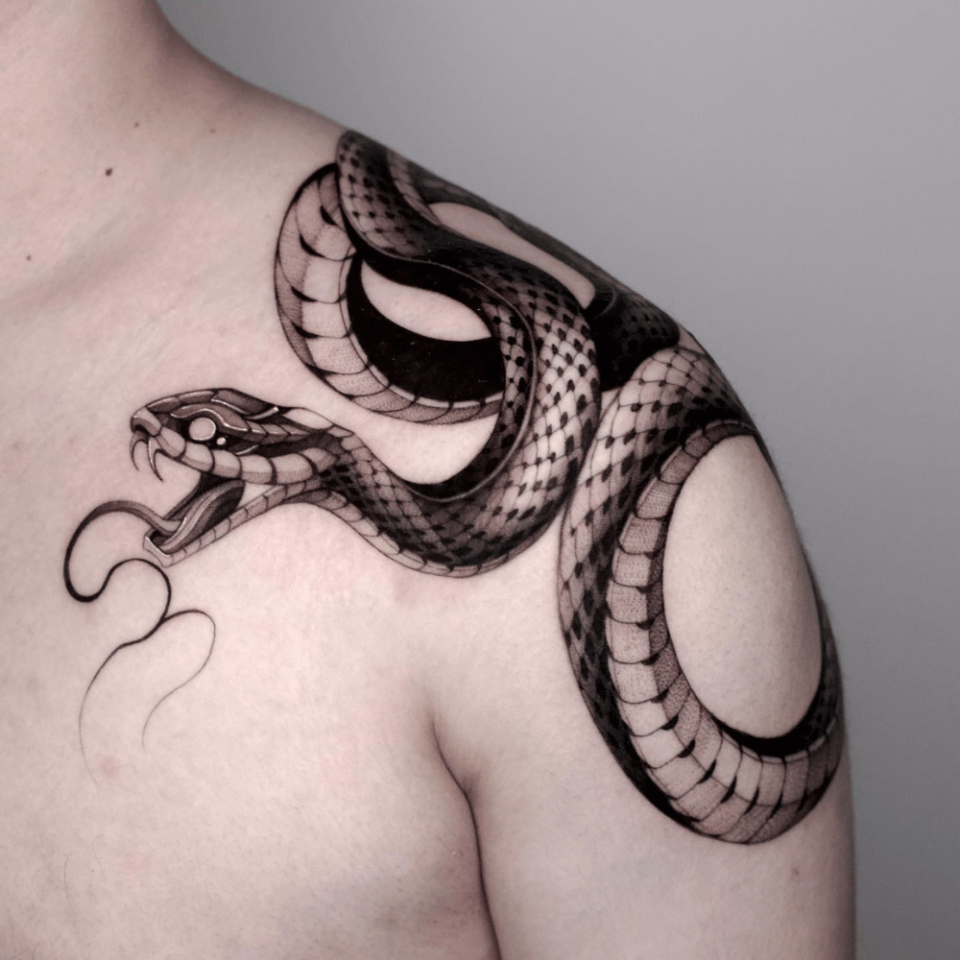 Snake Shoulder Tattoo Source @gush.like.kush via Instagram