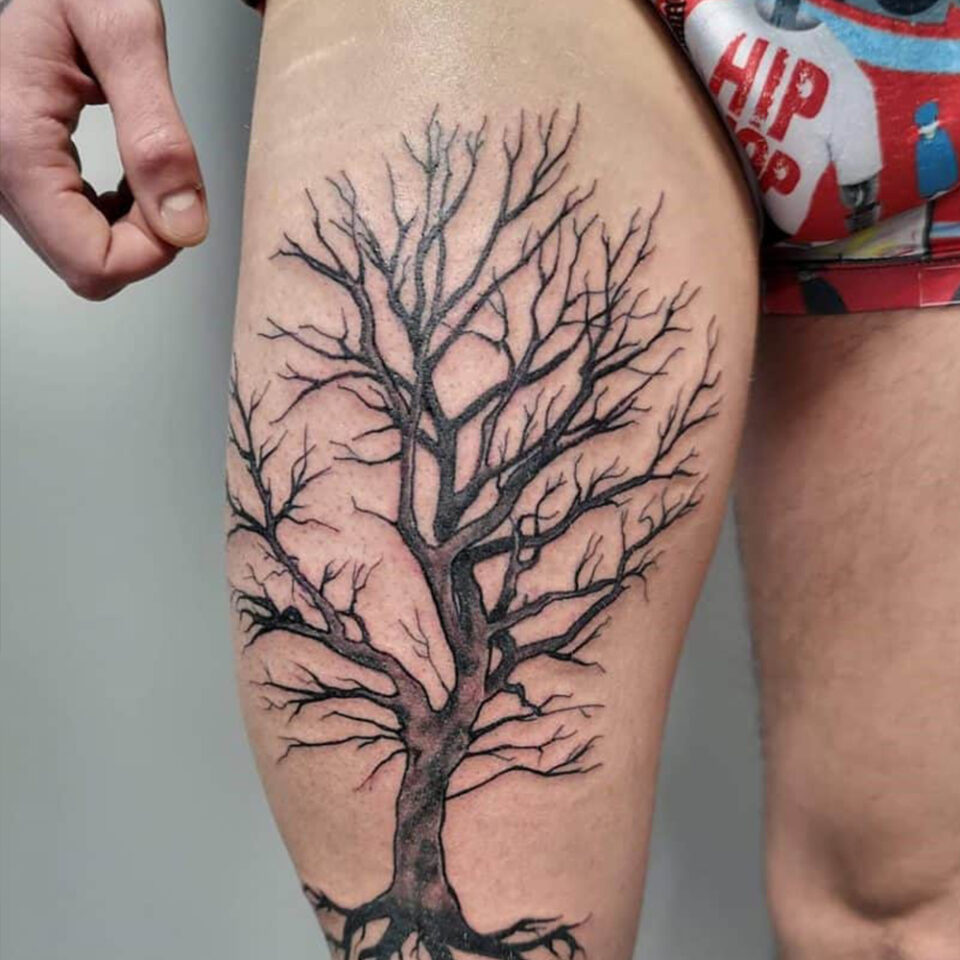 Tree of Life Thigh Tattoo Source: @sharks.tattoo via Instagram