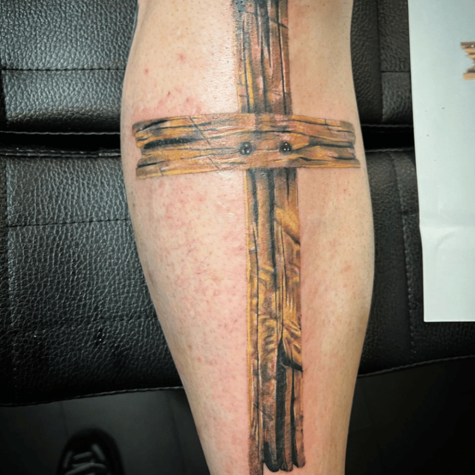 Wooden Cross Tattoo Source @andrew.williams.art via Instagram