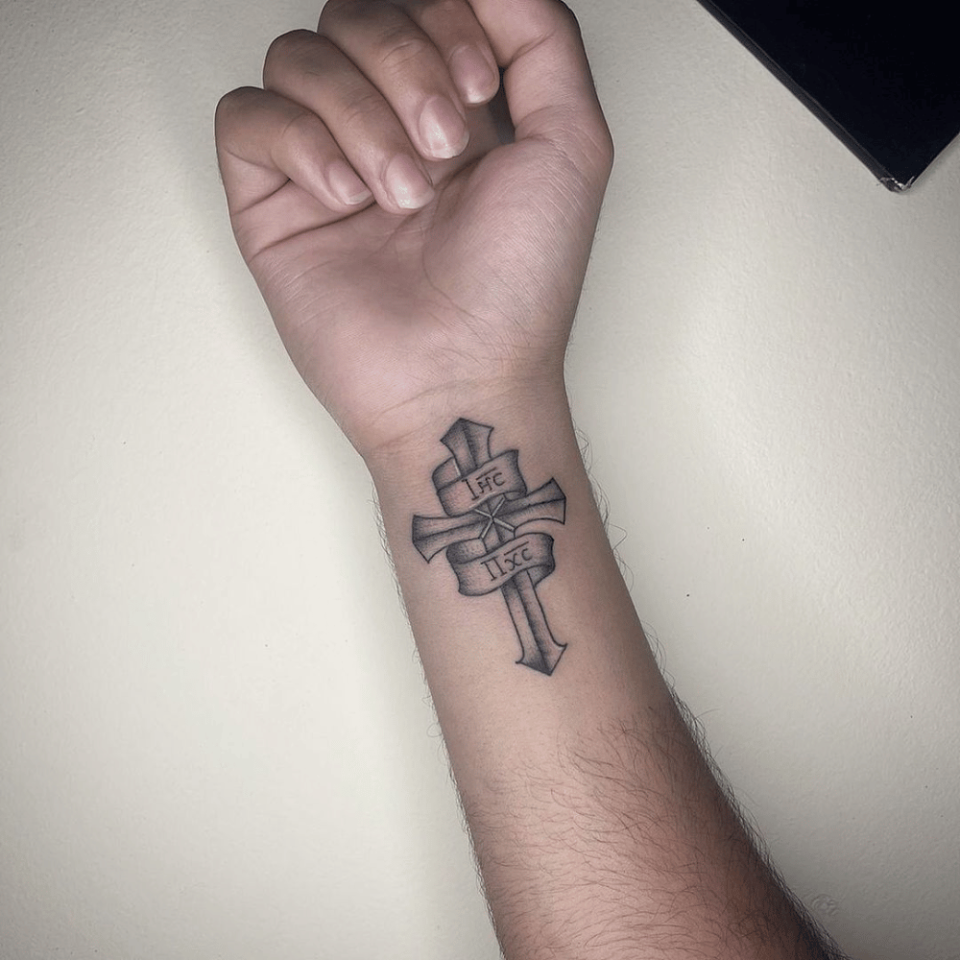 Wrist Cross Tattoo Source @the_inkredible_shop via Instagram