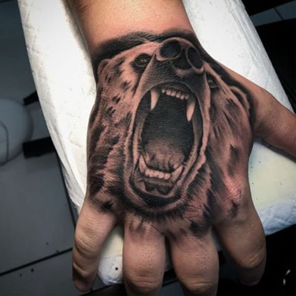 bear hand tattoo