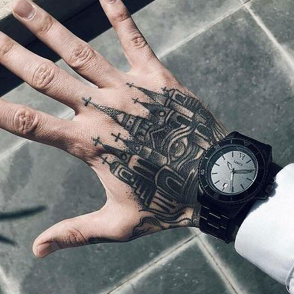 religious hand tattoo