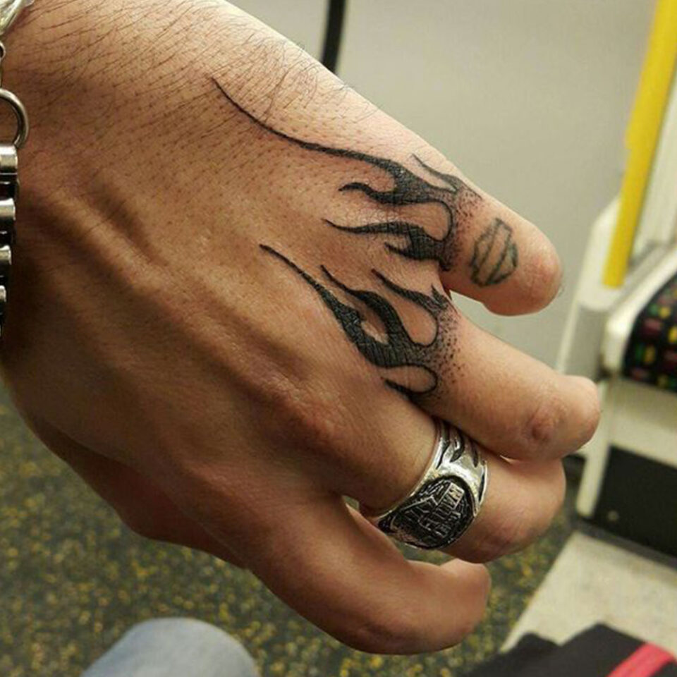 flame hand tattoo