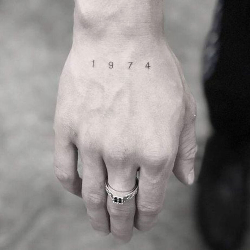 lettering hand tattoo