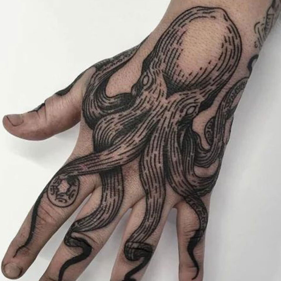 octopus hand tattoo