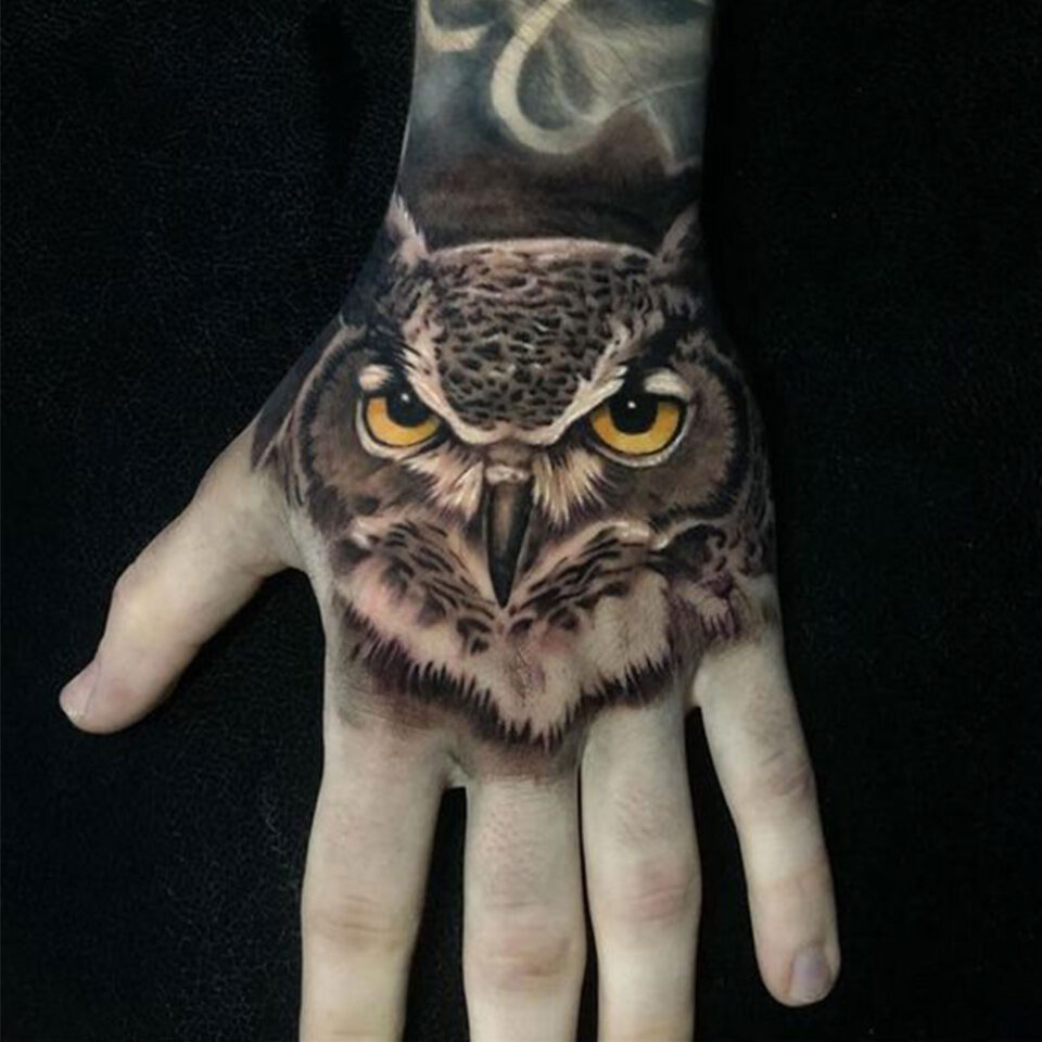 owl hand tattoo