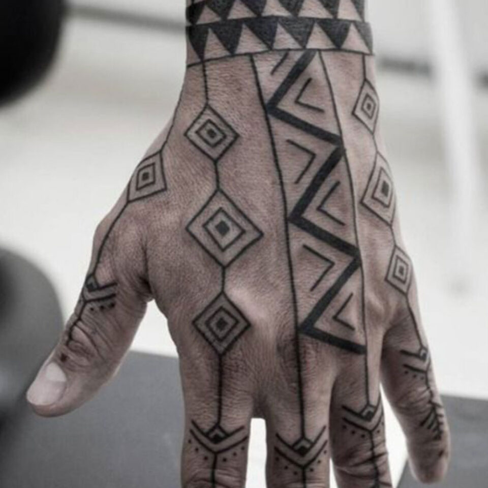 polynesian hand tattoo