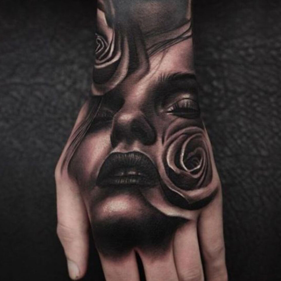 portrait hand tattoo