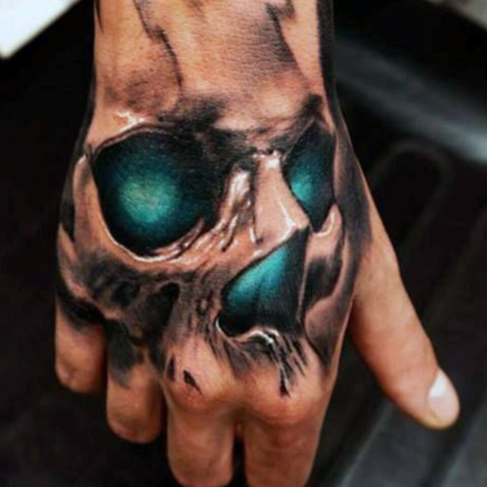 skull hand tattoo