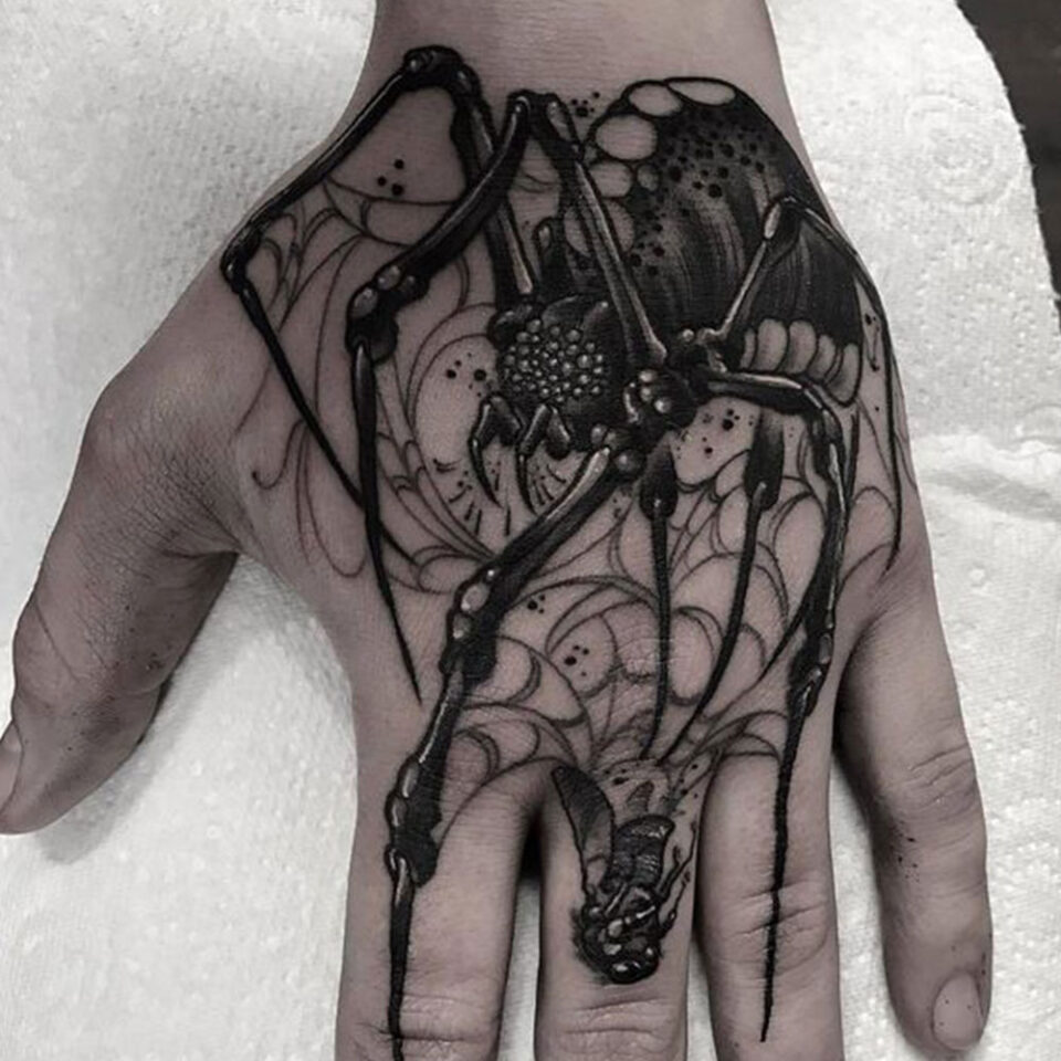 spider hand tattoo
