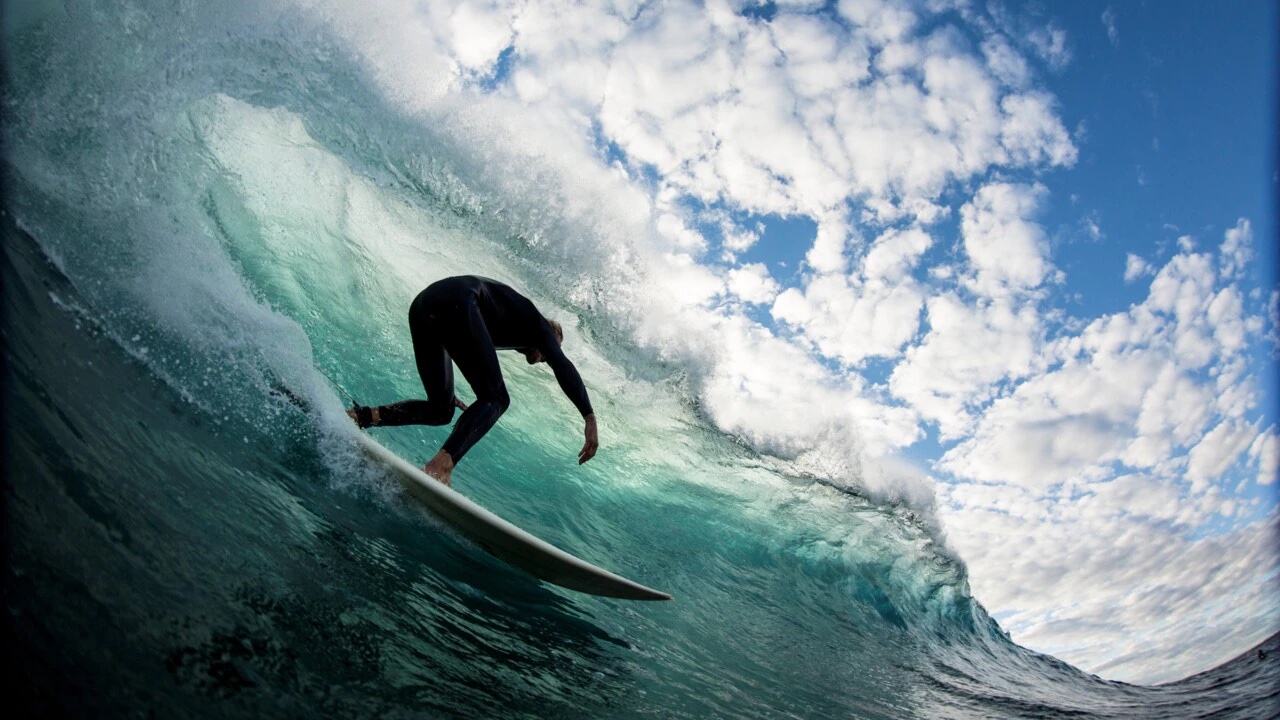 Blake Johnston rides a huge wave.